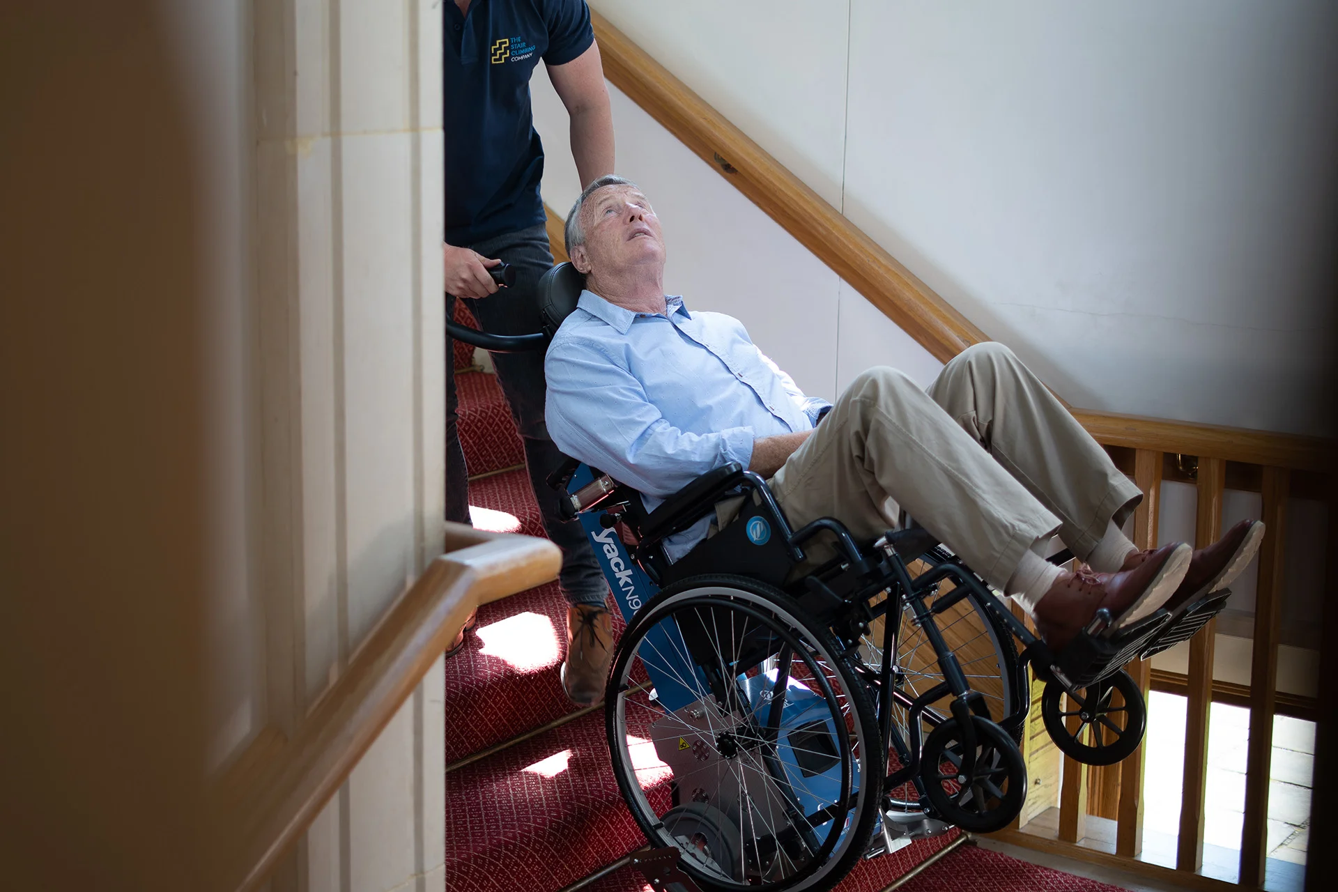 A stair climber being used on stairs of a public building ...