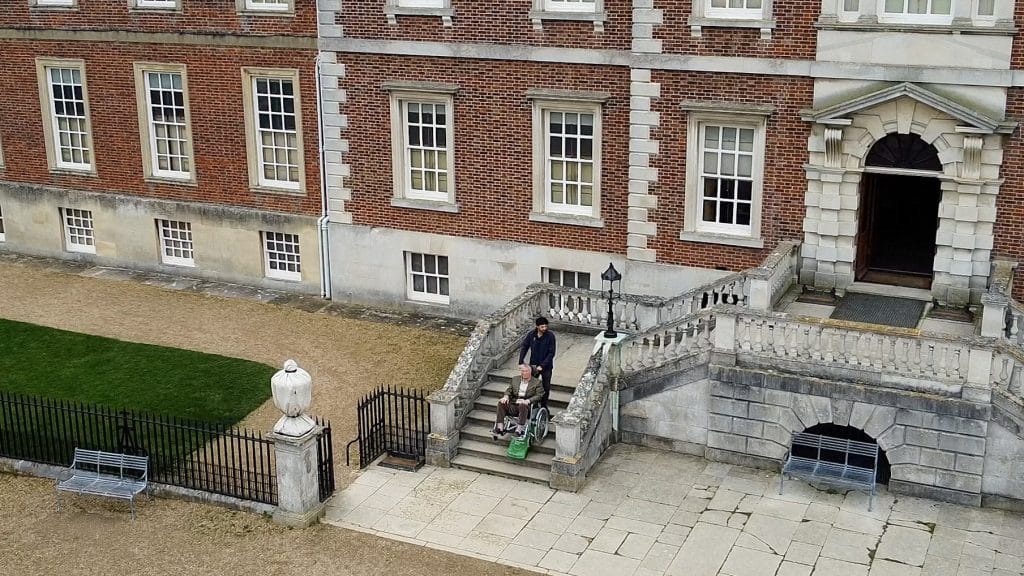 A stair climber being used on stairs of a public building ...
