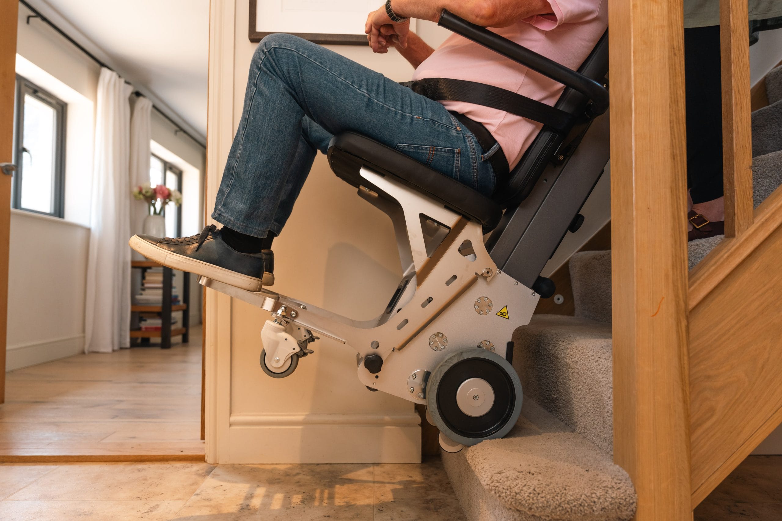 A stair climber being used on stairs of a home ...